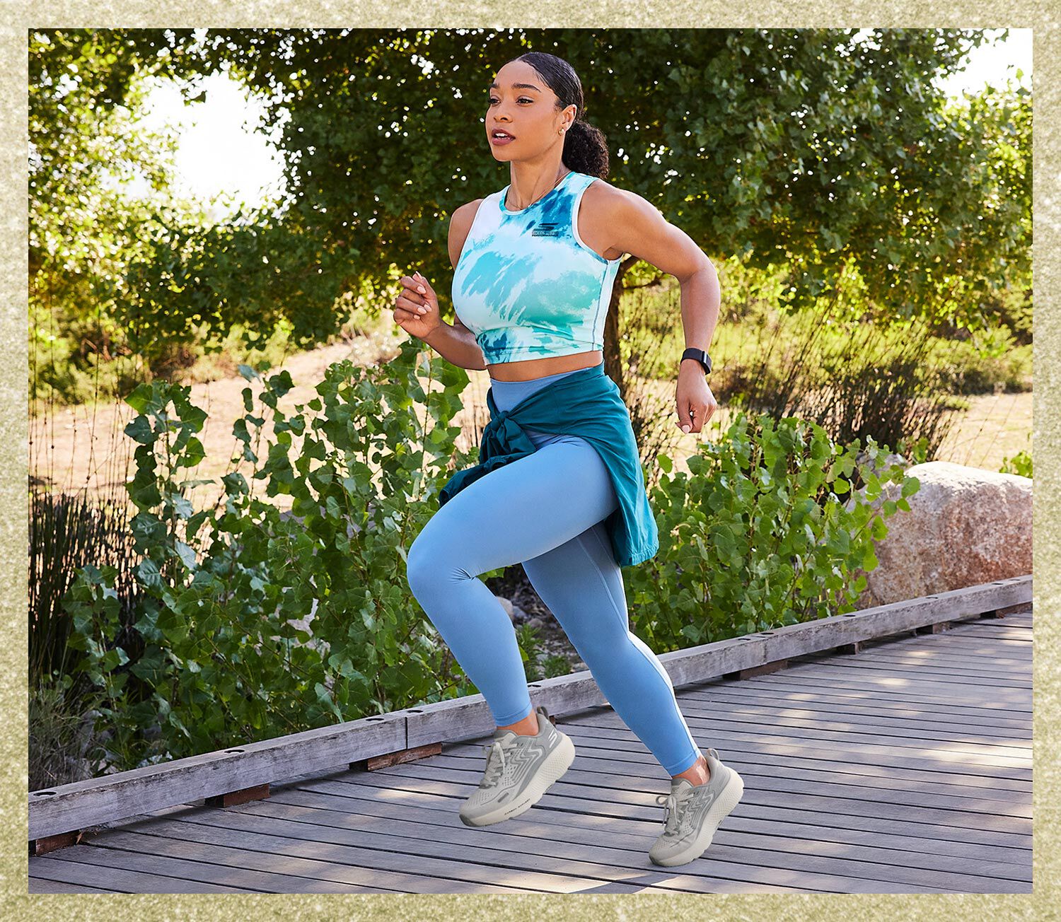 Girl running with Skechers running shoes